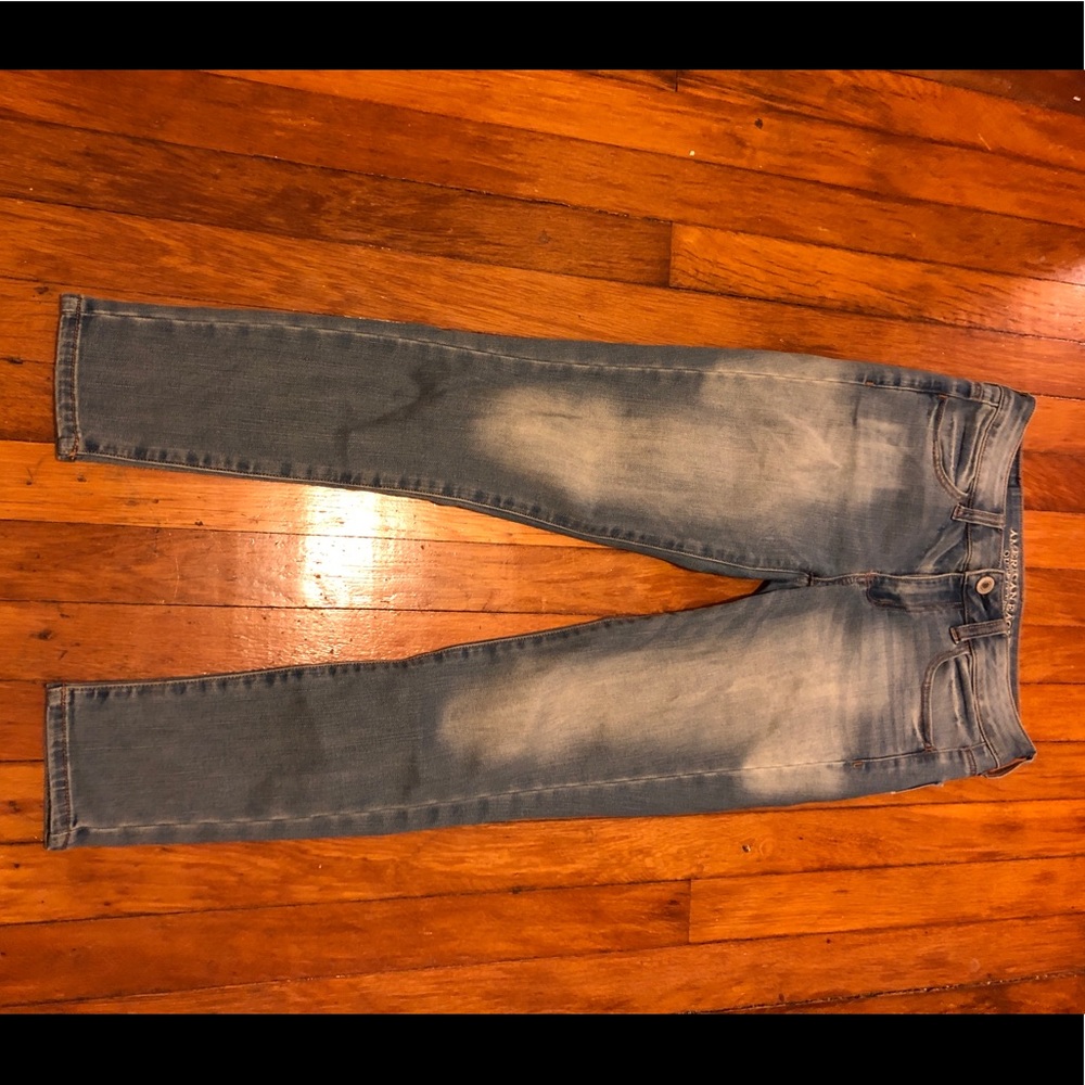 Distressed light wash jeans